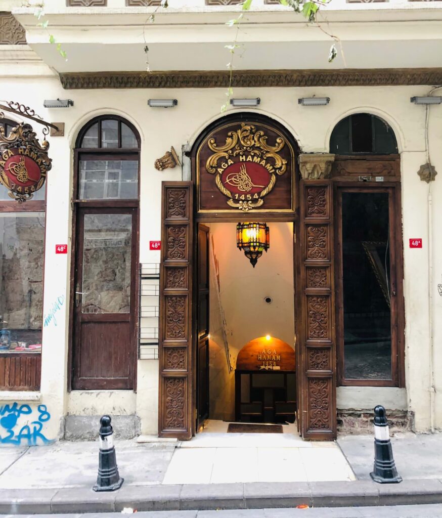 AĞA HAMAMI IN BEYOĞLU Opening Hours: Everyday 10:00-22:00, but you should arrive not later than 20:30. Address: Kuloğlu, Turnacıbaşı Cd. No:48, 34433 Beyoğlu/İstanbul Phone: +90 212 249 50 27 Price Range: from 1650 TL (60 USD) Our journey through Istanbul’s hammams begins with Ağa Hamamı, one of the oldest Turkish baths in the city, founded in 1454. This historic hammam, nestled in the Cihangir district of Beyoglu, was initially reserved for Sultan Mehmed the Conqueror and his sons. Later, Sultan Abdulmecid oversaw its renovation in the 19th century, making it accessible to the royal family.